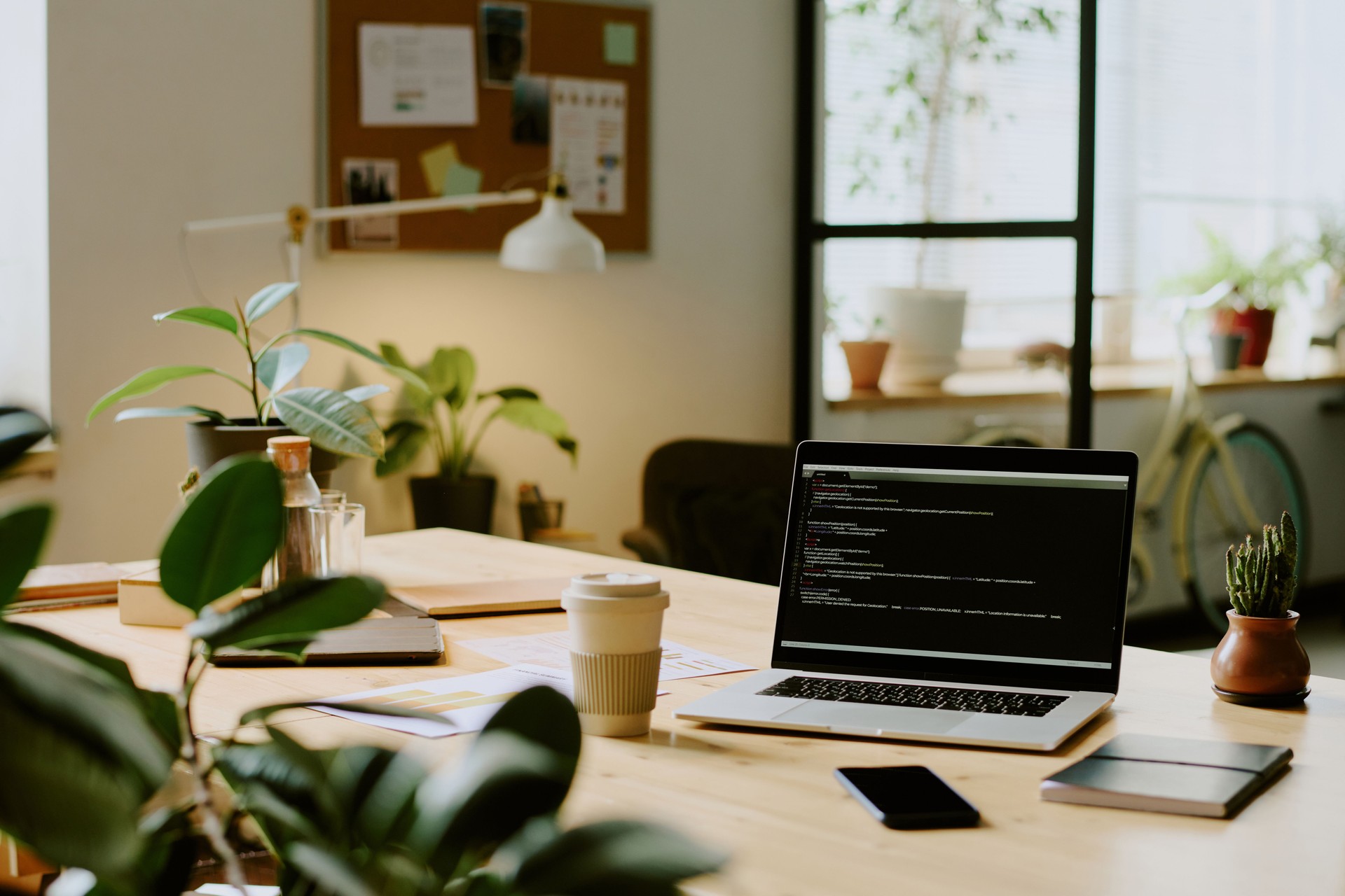 Laptop On Desk In Eco-friendly Office