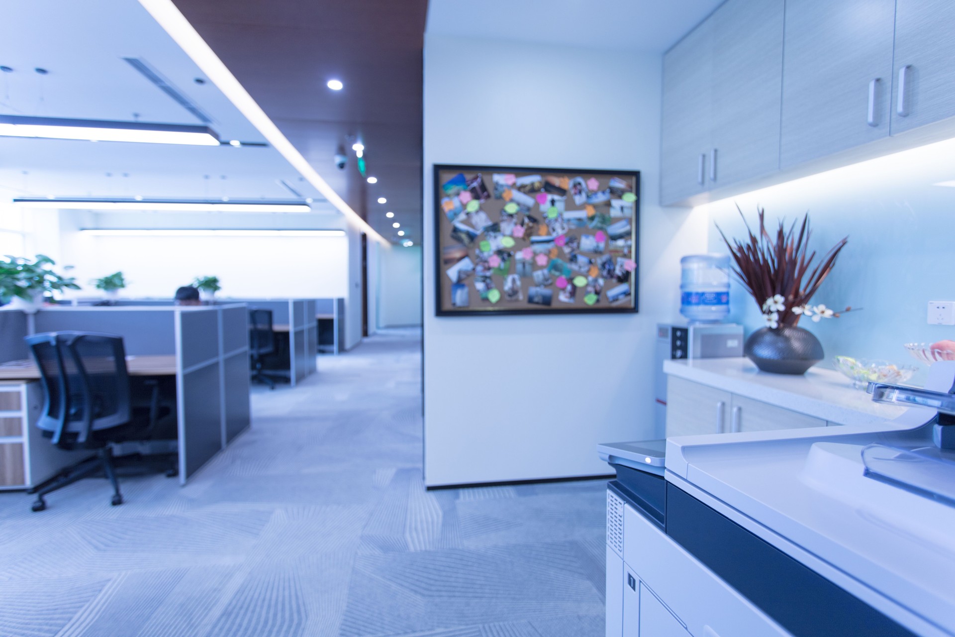 Office interior, lounge area and copier